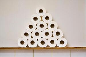 Pile of toilet paper in wc photo