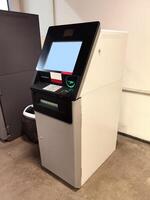 Modern ATM with contactless access function. No people. photo