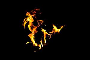 Fire flame texture. Burning material backdrop. Burn effect pattern. Blaze and torch wallpaper. Heat and haze backdrop. photo