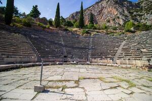 Ancient amphitheater of Delphi. Famous Archaeological site in Greece. God of Appollo temple. View of the ancient amphitheater. photo
