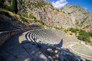 Ancient amphitheater of Delphi. Famous Archaeological site in Greece. God of Appollo temple. View of the ancient amphitheater. photo