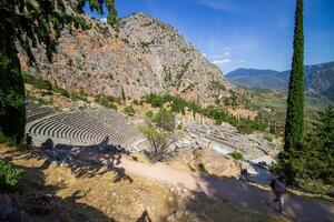 Ancient amphitheater of Delphi. Famous Archaeological site in Greece. God of Appollo temple. View of the ancient amphitheater. photo