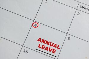 Annual Leave write on calendar. Date 8. Reminder or Schedule Concepts photo