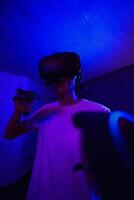 The player plays the game using virtual reality. Neon style. photo