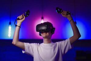 The player plays the game using virtual reality. Neon style. photo