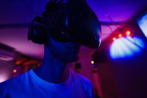 The player plays the game using virtual reality. Neon style. photo