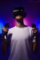 The player plays the game using virtual reality. Neon style. photo
