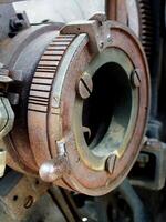 Close up of a part of the internal structure of an engine. Grunge steampunk industrial machine concept design image background photo