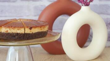 Caramel custard pudding on a plate on table video