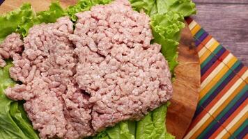 top view of beef mince and fresh vegetables on table . video