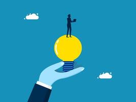 Thinking of creating. Businessman with laptop on creative light bulb vector