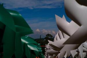 Photography of several Pinwheels hanging from a string. Background of ornaments that decorate the amusement park. Graphic Resources. Background Photography. Travel Destinations photo