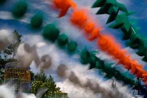 Blurred and defocused photo of Rows of spinning Pinwheels. Background of natural scenery in amusement park. Graphic Resources. Background Photography. Blurred Background