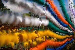 Blurred and defocused photo of Rows of spinning Pinwheels. Background of natural scenery in amusement park. Graphic Resources. Background Photography. Blurred Background