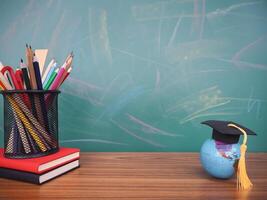 Student creative desktop, earth globe with graduation hat and colorful stationery on hardcover book. Copy space for text, Back to school, Education concept photo