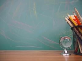 Student creative desktop , earth globe and colorful stationery. Copy space for text, Back to school, Education concept photo