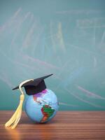 Earth globe with graduation hat. Copy space for text, Back to school, Education concept photo