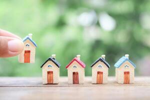 The concept of choosing the best property, choosing suitable house for planning living in the future. Real estate photo
