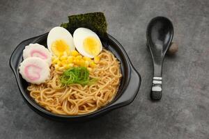 Ramen Noodles with egg and various topping photo