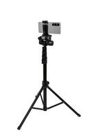 Smartphone mounted on a tripod. Stable photo or shooting for a blog or social media content. Isolate on a white back.