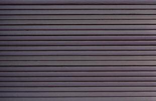 old external blinds on windows- texture. painted wooden surface. creative background photo