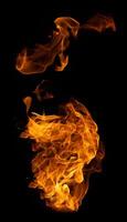 Fire and burning flame of explosive fireball isolated on dark background for abstract graphic design photo