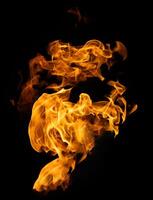 Fire and burning flame of explosive fireball isolated on dark background for abstract graphic design photo