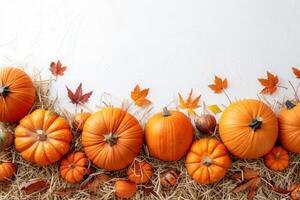 Vibrant Autumn Arrangement of Pumpkins on Hay With Colorful Leaves photo