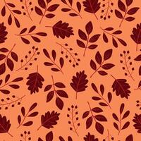 Autumn seamless pattern with autumn leaves on a peach background. Autumn background. vector