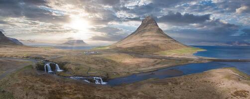 Aerial View of Icelandic Mountain Range with Cascading Waterfalls photo