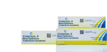 CHONBURI, THAILAND-JUNE 14, 2024 Gardasil 9 HPV vaccine. Prevention of Human Papillomavirus, 9-valent recombinant vaccine in paper box packaging, an MSD product. HPV prevention and sterile packaging. photo