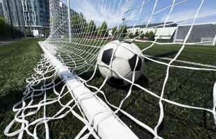 Goal in the back of net in soccer game photo