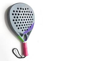 paddle tennis racket on white table and white isolated background. Front view. photo
