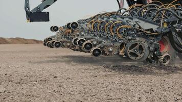 Close-Up of Modern Agricultural Machinery, Detailed view of advanced agricultural machinery in a field, highlighting the intricate components and technology used in modern farming video