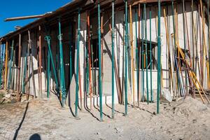 view of a granite stone house under construction photo