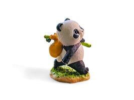miniature panda walking on a white background photo