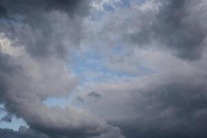 View on low thunderstorm clouds in the sky photo