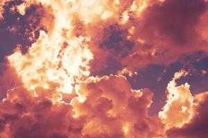 Dramatic view of a red clouds in the sunset sky photo