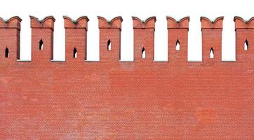 Close up view on a fragment of red brick wall with a dovetail-shaped merlon battlement, isolated on a white background photo