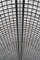 Perspective view to hemispherical ceiling of glass and metal in modern building as background, texture, abstract photo