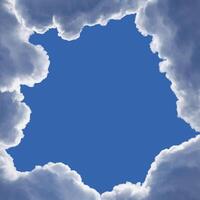 Framing from the fluffy clouds with highlighted edges in the blue sky with copy space photo
