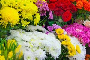Close up view of a multi colored bouquets in the store photo