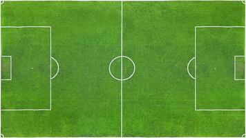 Top view of a green football field as texture, background photo