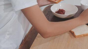 Closeup image of a chef cooking whole wheat sandwich and vegetables salad in kitchen video