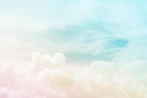 Abstract view on a soft cumulus fluffy clouds in the fantastic light sky as background photo