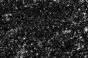 Snowfall on a black background - design element photo