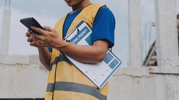 Construction worker, tablet and portrait of man with research and digital data for solar panel installation. Happy, engineer and male contractor with eco and energy project with tech and online plan video