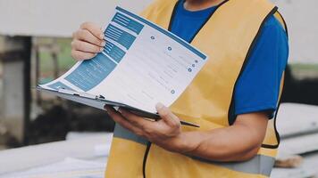 Construction worker, tablet and portrait of man with research and digital data for solar panel installation. Happy, engineer and male contractor with eco and energy project with tech and online plan video