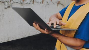 Construction worker, tablet and portrait of man with research and digital data for solar panel installation. Happy, engineer and male contractor with eco and energy project with tech and online plan video