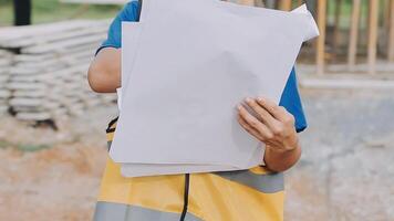 Construction worker, tablet and portrait of man with research and digital data for solar panel installation. Happy, engineer and male contractor with eco and energy project with tech and online plan video